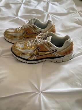 Nike White and Gold Running Sneakers